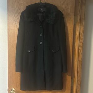 knee length women’s dress coat with faux fur collar.